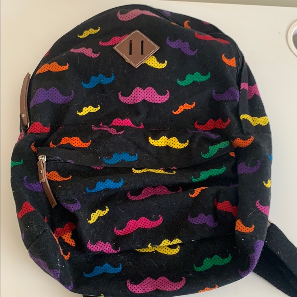 black colorful mustache backpack